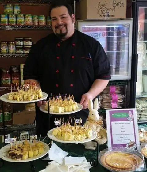 Giovanni with trays of Easter pie samples